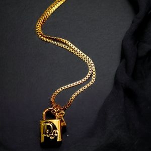 Petite lock pendant with Stainless steel key gold plated